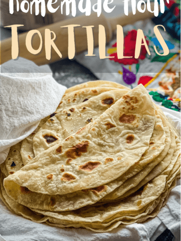 Photo of tortillas in a white cloth with text that reads homemade flour tortillas pillowy soft authentic mexican recipe