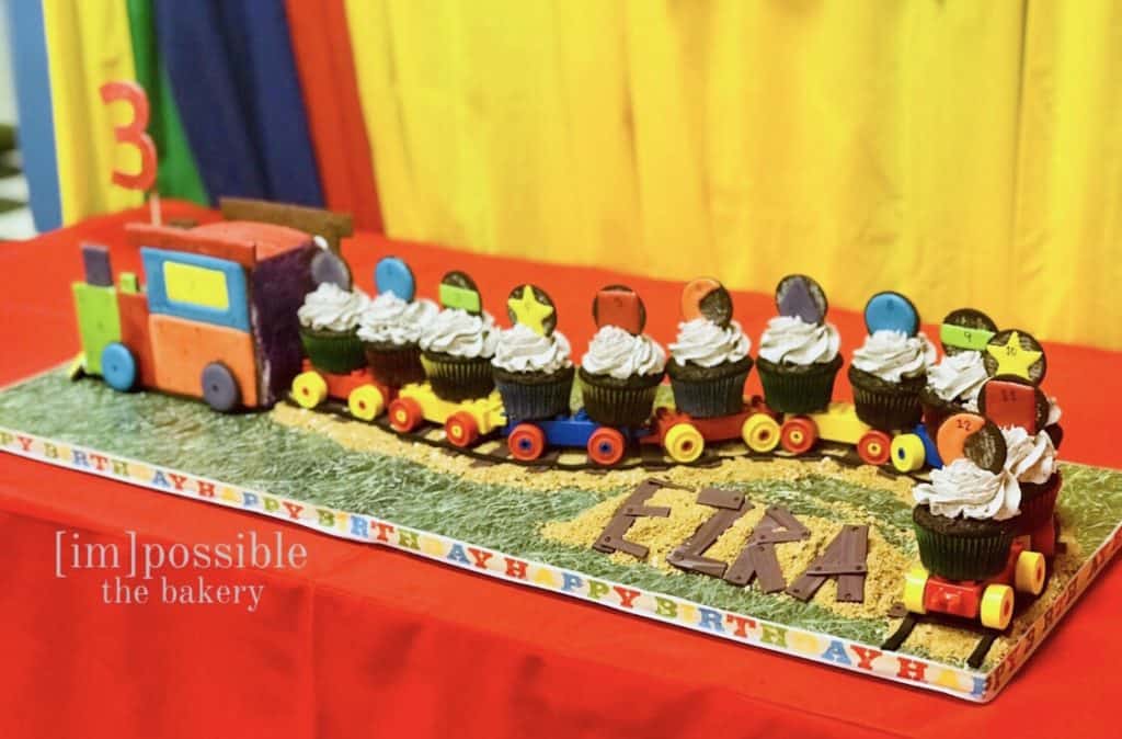 A train cake I made with this recipe - the engine is cookies and cream cake and the cars are cupcakes