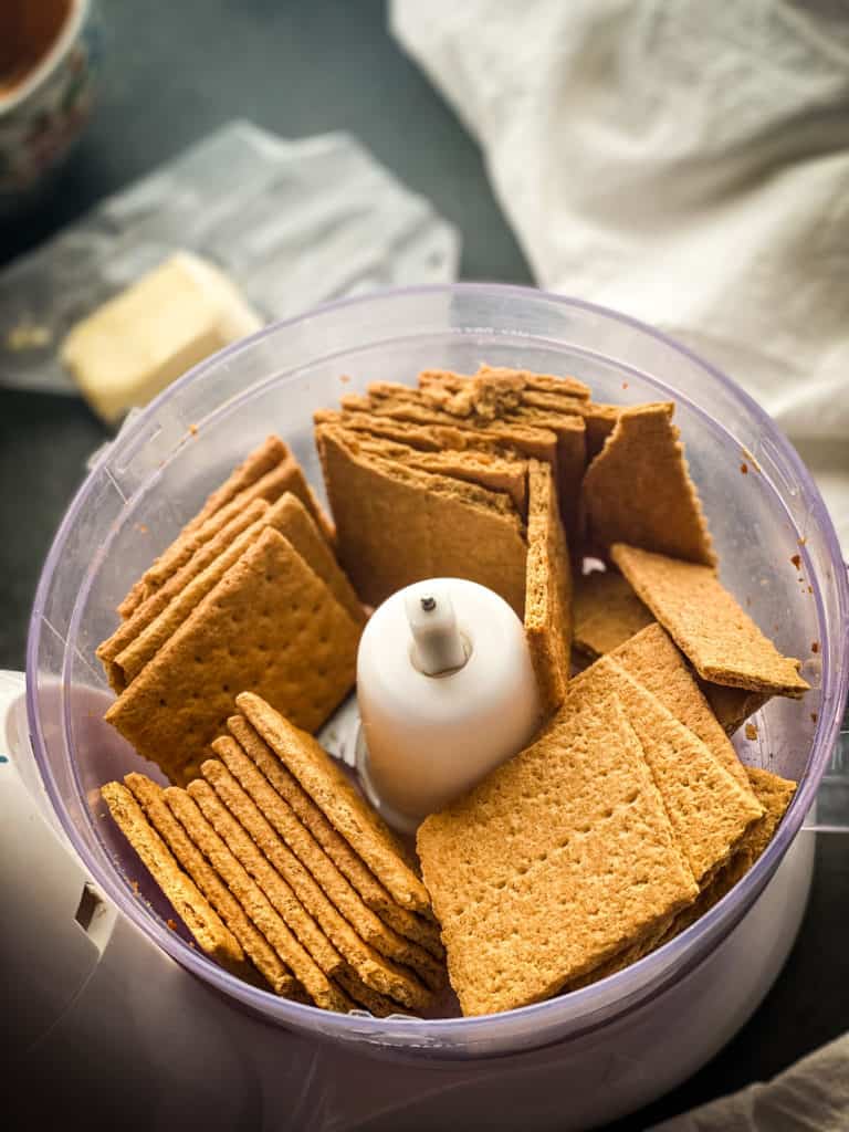 whole graham crackers in a food processor bowl