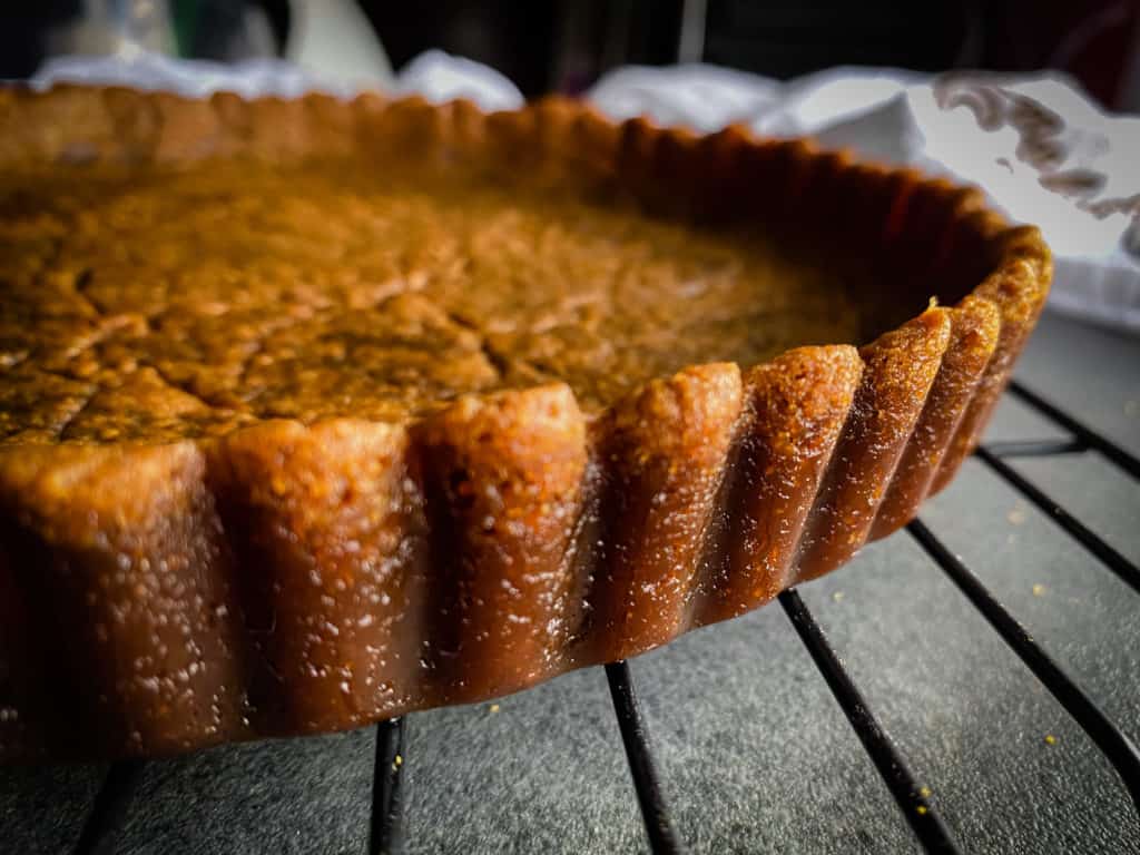 The edges of the finished crust hold their shape perfectly. This picture shows the exact shape of the scalloped edge of a tart pan.