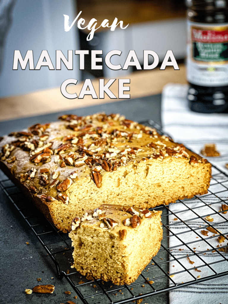 the mantecada cake on a cooling rack with a single serving in front of it.